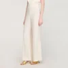 Buttoned-slit straight-leg trousers Buttoned-slit straight-leg trousers