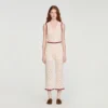 Crochet-look knit trousers