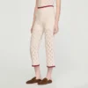Crochet-look knit trousers
