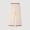 Crochet-look knit trousers