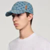 Denim cap with cross motif