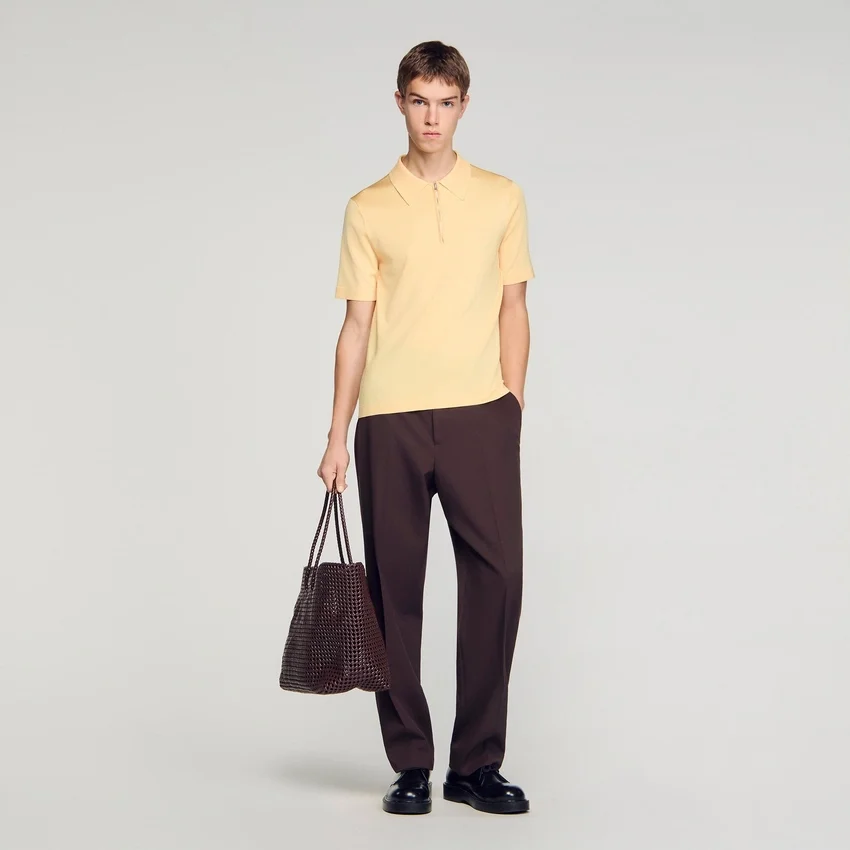 Knitted polo shirt with zip collar Knitted polo shirt with zip collar