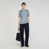 Knitted polo shirt with zip collar Knitted polo shirt with zip collar