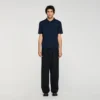 Knitted polo shirt with zip collar Knitted polo shirt with zip collar