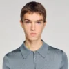 Knitted polo shirt with zip collar Knitted polo shirt with zip collar