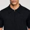 Knitted polo shirt with zip collar Knitted polo shirt with zip collar