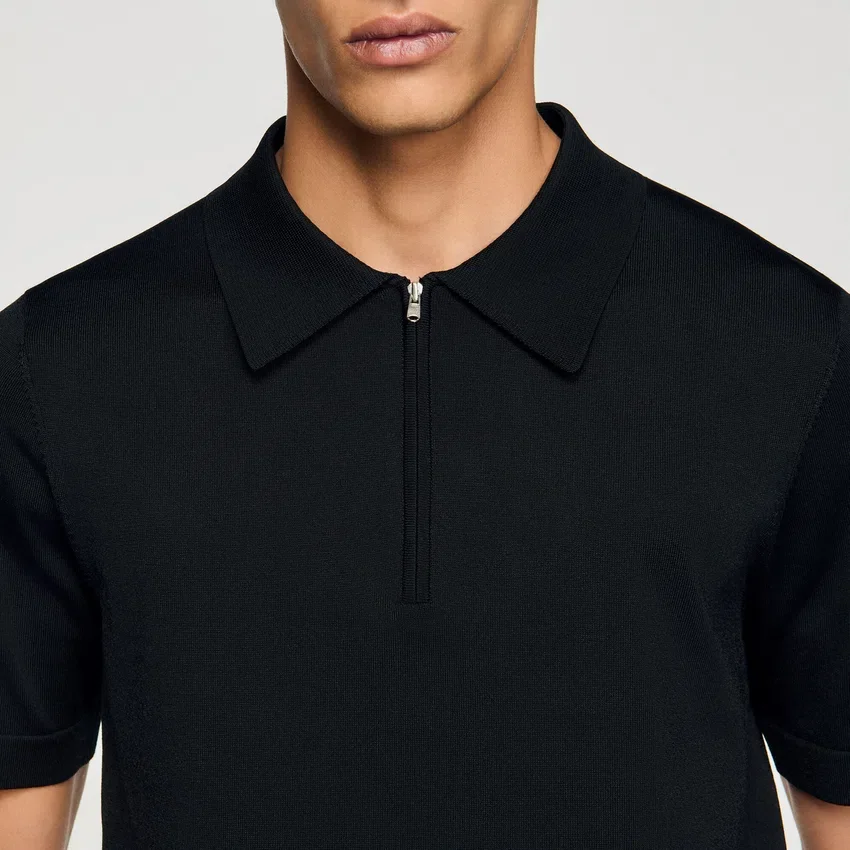 Knitted polo shirt with zip collar Knitted polo shirt with zip collar