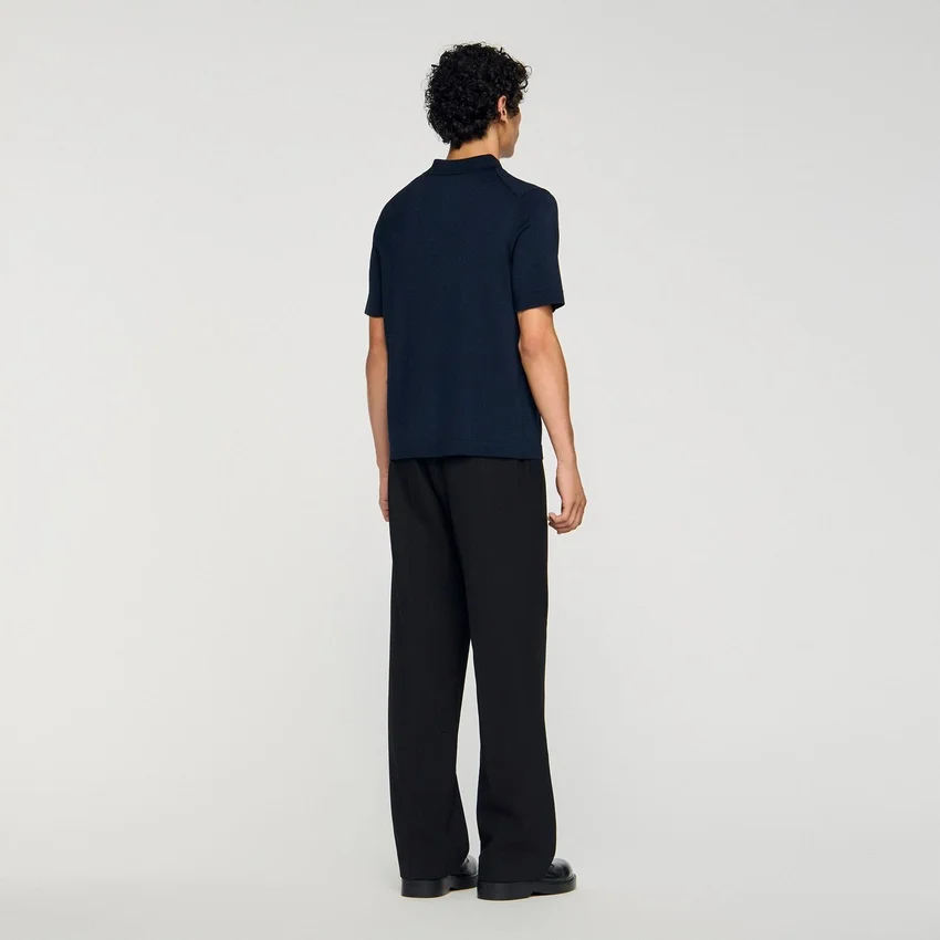 Knitted polo shirt with zip collar Knitted polo shirt with zip collar