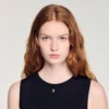 Sleeveless short knit sweater Sleeveless short knit sweater
