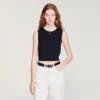Sleeveless short knit sweater Sleeveless short knit sweater