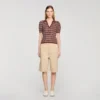 Striped V-neck polo sweater Striped V-neck polo sweater