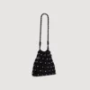 Studded net mesh bag
