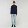 Wool sweater with high neck